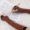 imageAllegra K Womens Fingerless Gloves Printed Elbow Length Knitted Arm WarmersOrange Black
