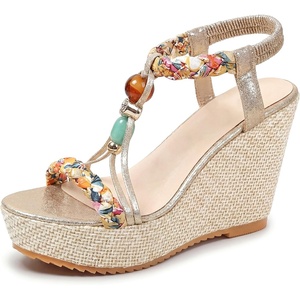 image:imageAllegra K Women Beaded Elastic Tstrap Platform Peeptoe Sandals Rubber  Cross decorative detailing Lightcatching sparkle Artisanal touch 433inch heel 157inch platformGold