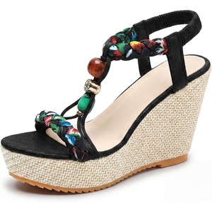 image:imageAllegra K Women Beaded Elastic Tstrap Platform Peeptoe Sandals Rubber  Cross decorative detailing Lightcatching sparkle Artisanal touch 433inch heel 157inch platformBlack